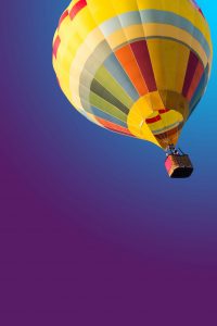 colourful hot air ballon in flight